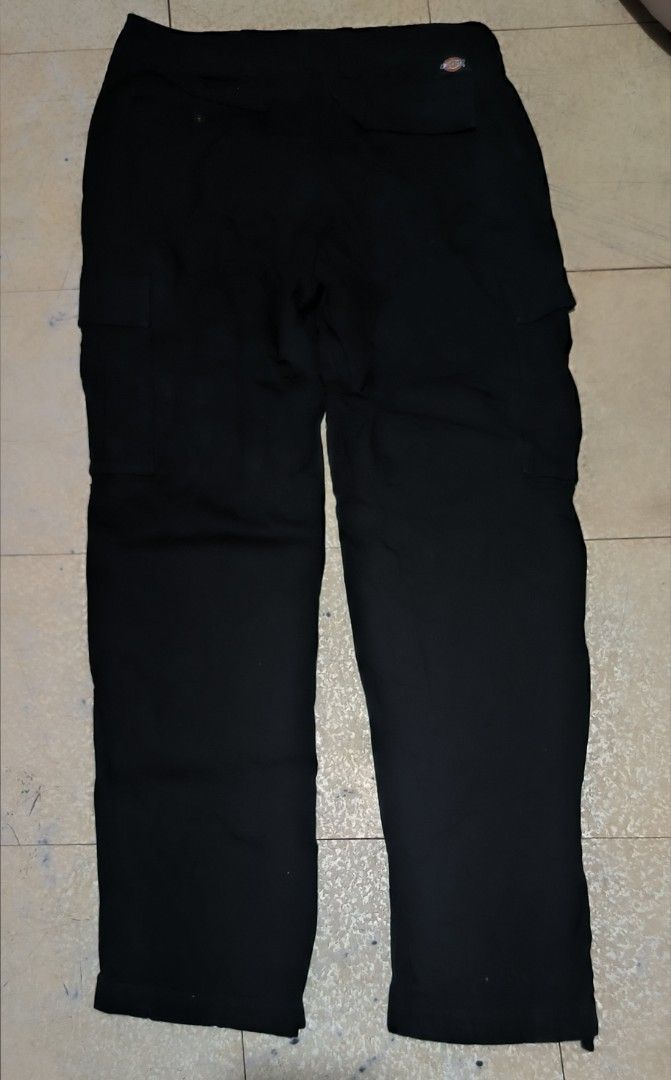 Dickies Double Patch Black Cargo Pant (Category: Jeans) located in Manila. Submitted by itsmelawrence (Listing ID 1456391143, Image 2). Description: - Brand: Dickies Double Patch - Color: Black 9.6/10 color rate - Sise 32-33 x 43 haba - Style: Cargo Pants (WT124BK) - Features: Multiple pockets for ample storage - Material: Durable fabric, built to last - Closure: Button waist - Details: Zippers at the ankle - Versatile: Ideal for workwear or casu