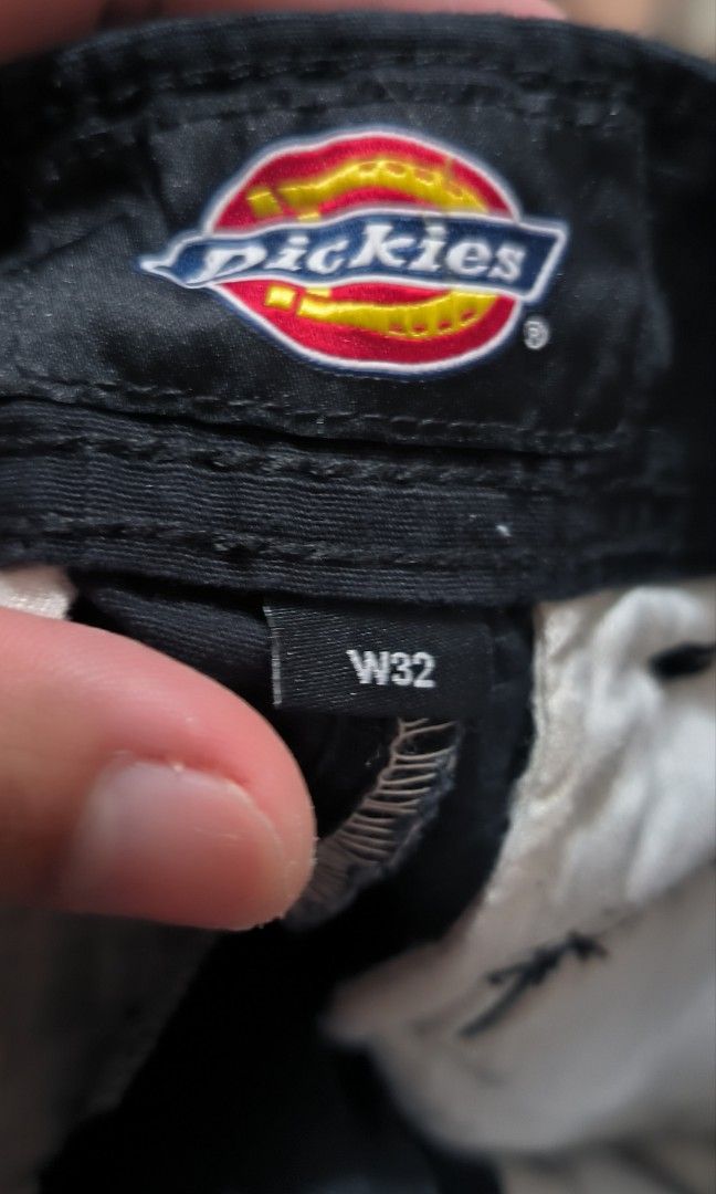 Dickies Double Patch Black Cargo Pant (Category: Jeans) located in Manila. Submitted by itsmelawrence (Listing ID 1456391143, Image 3). Description: - Brand: Dickies Double Patch - Color: Black 9.6/10 color rate - Sise 32-33 x 43 haba - Style: Cargo Pants (WT124BK) - Features: Multiple pockets for ample storage - Material: Durable fabric, built to last - Closure: Button waist - Details: Zippers at the ankle - Versatile: Ideal for workwear or casu