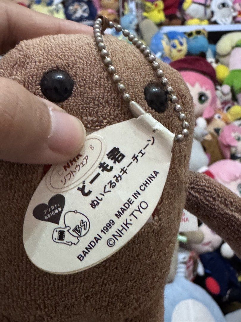 Domo-Kun plush charm (Category: Plushies & Soft Toys) located in Antipolo. Submitted by bhabiegraciefashionlab (Listing ID 1456253017, Image 3). Description: 480 ea or 1,800 set - 2pcs Vintage Domo kun charms, 1pc with papertag - 2pcs Vintage blue Digital Domo kun charms, 1pc with papertag.