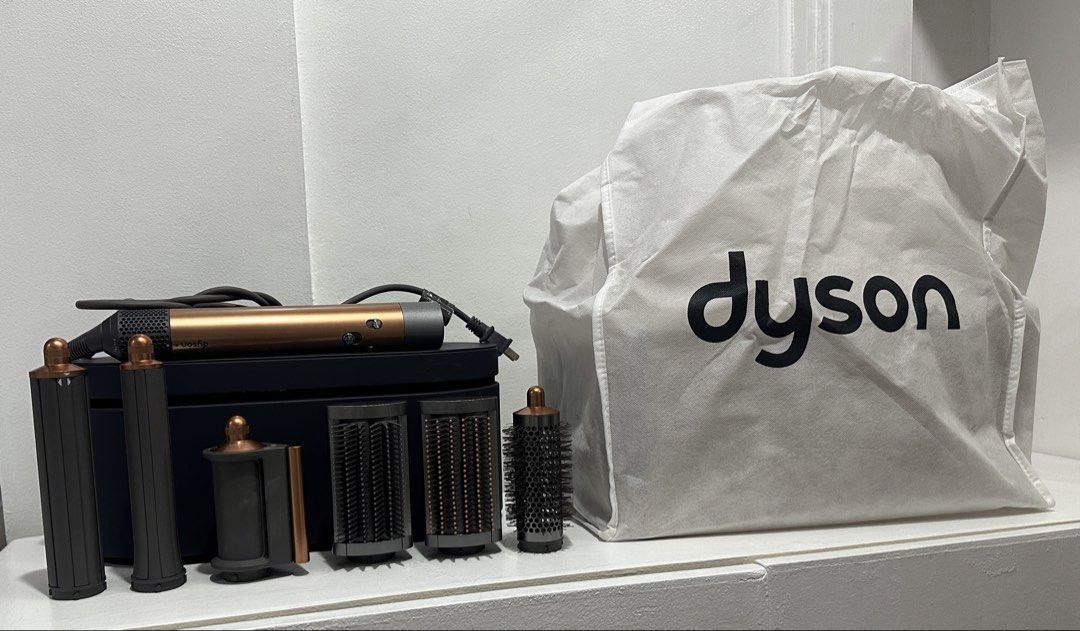 Dyson Airwrap Complete Styler Set (Category: Hair) located in Manila. Submitted by braveearth_09a8d2 (Listing ID 1456371252, Image 1). Description: Dyson Airwrap Multi-Styler Complete – Used, Like New Selling my authentic Dyson Airwrap Multi-Styler Complete ✨ Condition: Used – Like New ● Excellent working condition ● Well maintained and lightly used ● No issues or defects ● Includes the original box, packaging, storage case and attachments shown 