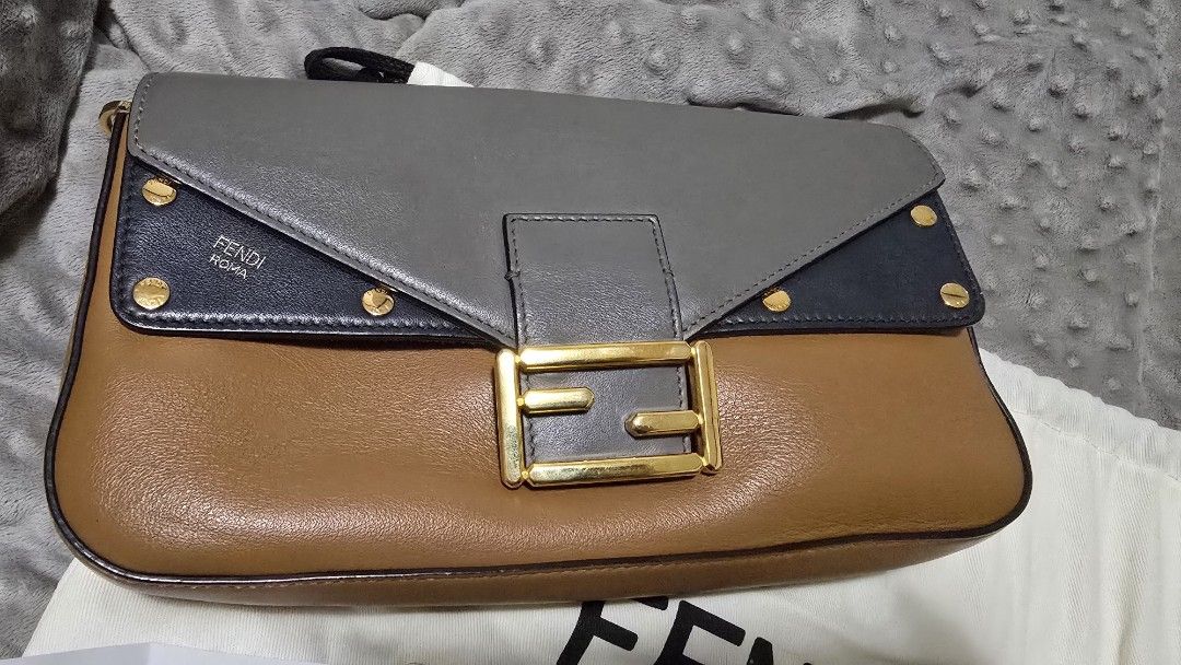 Fendi Baguette Bag with Strap (Category: Luxury Bags & Wallets) located in Las Pinas. Submitted by insouciant_worrier (Listing ID 1456411337, Image 2). Description: Take note: - bought from an online luxury bag reseller (instagram) - with authenticity card - some creasing (see images) - Slightly negotiable - RFS: decluttering - Authentic Fendi Baguette Bag with FF strap - Includes: Original dust bag, authenticity card, delivery receipt.