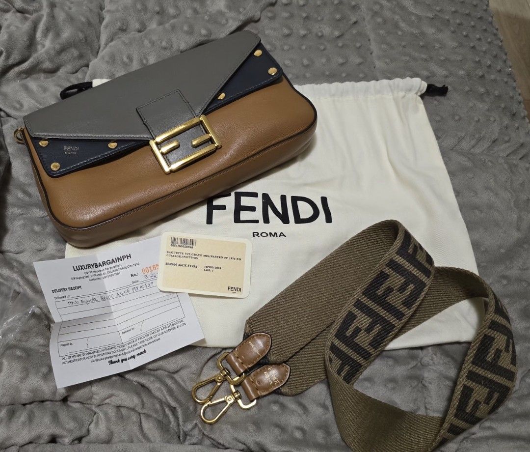 Fendi Baguette Bag with Strap (Category: Luxury Bags & Wallets) located in Las Pinas. Submitted by insouciant_worrier (Listing ID 1456411337, Image 1). Description: Take note: - bought from an online luxury bag reseller (instagram) - with authenticity card - some creasing (see images) - Slightly negotiable - RFS: decluttering - Authentic Fendi Baguette Bag with FF strap - Includes: Original dust bag, authenticity card, delivery receipt.