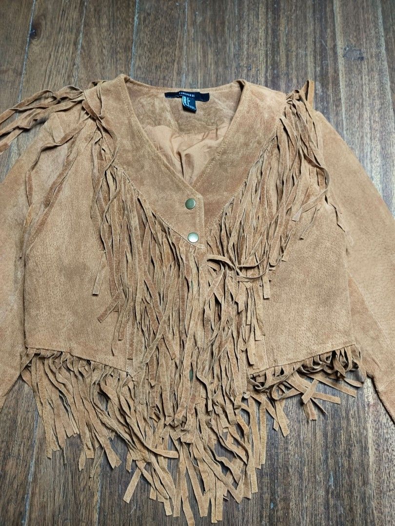 Forever21 fringe leather jacket (Category: Coats, Jackets and Outerwear) located in Mandaluyong City. Submitted by beloved_kirara (Listing ID 1456371402, Image 2). Description: good condition no issue small on tag dimension L 15 w 18 S 22.5 800 + sf location mandaluyong willing to meet up as long as it's near my area.