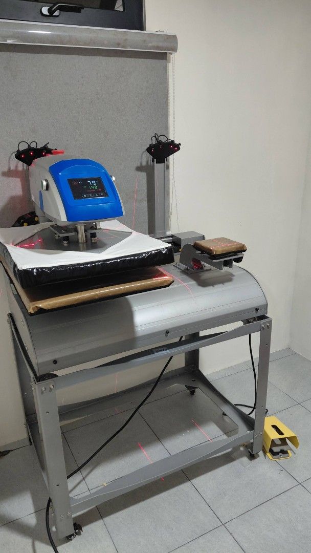 Fully Automatic Dual-Station Platen Heat Press Machine (Category: Printers, Scanners & Copiers) located in Cavite. Submitted by helpusdeclutter (Listing ID 1456262766, Image 1). Description: Fully Automatic Dual-Station Platen Heat Press Machine • Imported from China in 2023. • In great condition. • SRP: P225,000. Selling for only P180,000. • Pick up in Nuvali. ● Semi-Automatic or Fully-Automatic Operation ● Automatic with Speed Control ● Hands o