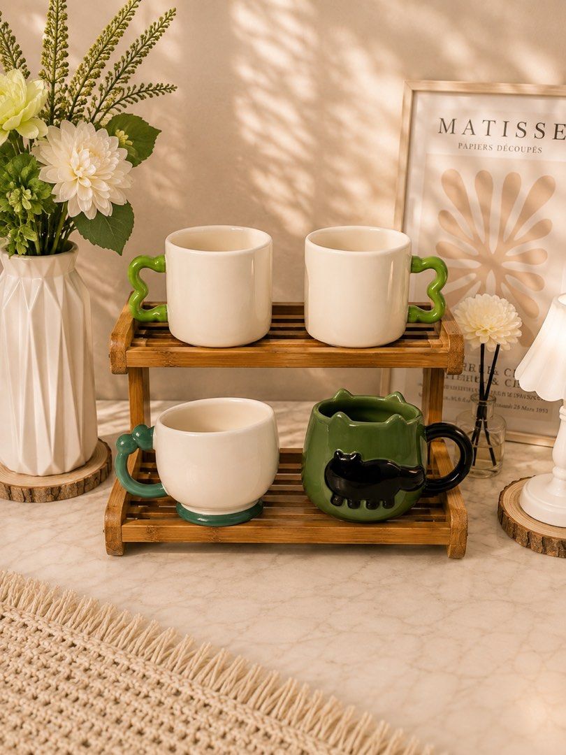 Green Cute Ceramic Mugs with Unique Handles (Category: Coffee & Tea Tableware) located in Caloocan City. Submitted by sujenzkiii (Listing ID 1456295034, Image 1). Description: 🧚‍♀️ PERFECT FOR EVERYDAY USE — Calling all girlies who love aesthetic finds, 3D mugs, cute mugs, and more! 💝 Styles available: 3D, Coquette, Plain & Aesthetic designs 🍵 Ceramic mugs imported from an international supplier — all brand new. Note: some pieces may have a sl