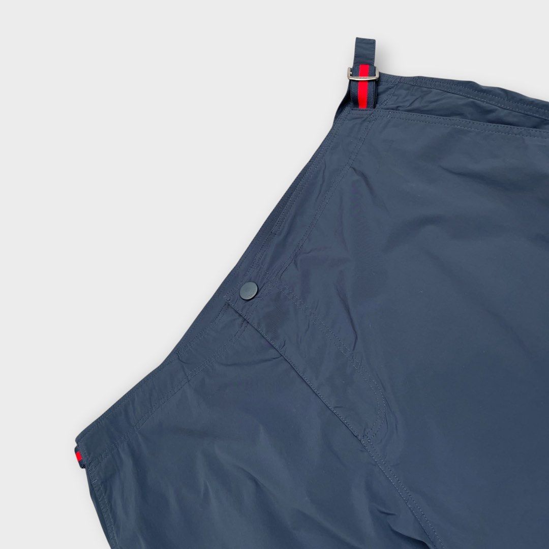 Gucci - Vintage - Nylon Navy Shorts (Category: Shorts) located in Los Banos. Submitted by declutterking (Listing ID 1456414932, Image 2). Description: Size 48 on tag • fits 32-34 waist • nylon material • it has built-in belts on the sides Dimensions: 17" waist 11.5" front rise 19.5" length 11.25" leg opening Good as new condition Authentic.