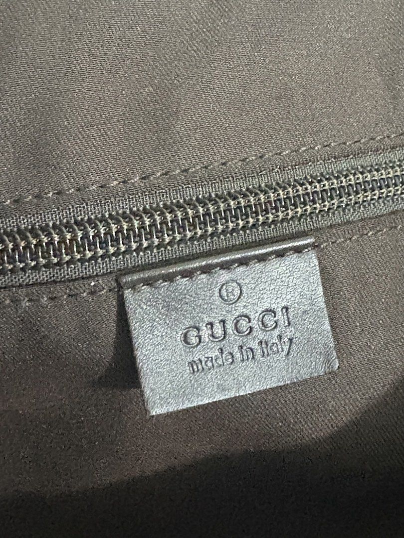Gucci GG Monogram Suitcase (Category: Luxury Bags & Wallets) located in Tarlac. Submitted by yourewelcome.1 (Listing ID 1456355497, Image 3). Description: 16 width 21 length Check last photo for issue - Classic Gucci suitcase - Iconic GG monogram canvas with leather trim - Branded zippers and hardware - Made in Italy - Serial number: 122804 002122 - Ideal for travel.