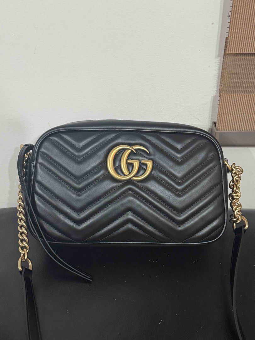 Gucci Marmont Camera Bag Black Leather (Category: Luxury Bags & Wallets) located in Guiguinto. Submitted by guwiiii (Listing ID 1456258895, Image 1). Description: - Authentic Gucci Marmont camera bag - Quilted leather with iconic gold GG logo - Elegant gold chain strap - Stylish tassel detail - Versatile for everyday wear or evening events W/ entrupy certificate ₱63,000 (still negotiable) .