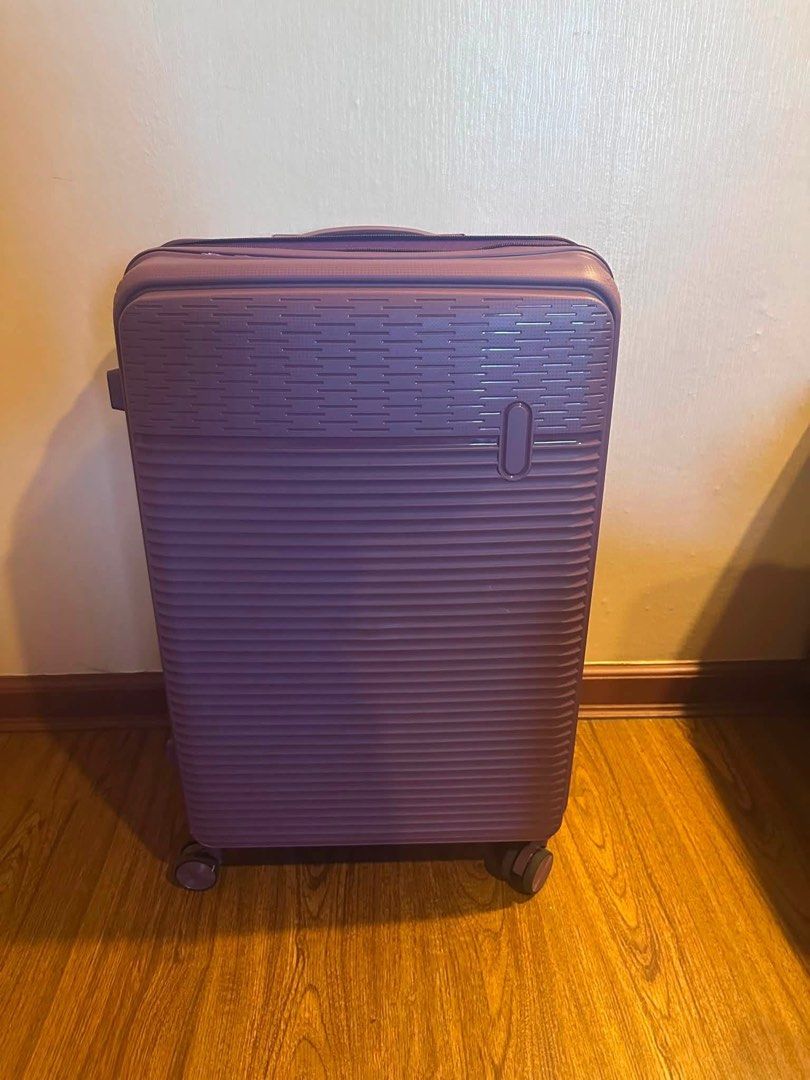 Hardcase Luggage - Pink and Purple (Category: Luggage) located in Mandaluyong City. Submitted by greenapple14 (Listing ID 1456351265, Image 2). Description: - Two hardcase luggages available: Dusty Rose Pink and Deep Purple. - Medium to large size, perfect for extended trips. - Textured exterior for added durability and style. - Smooth 4-spinner wheel system for easy maneuverability. - Ideal for your next adventure! - Option to purchase one or bo