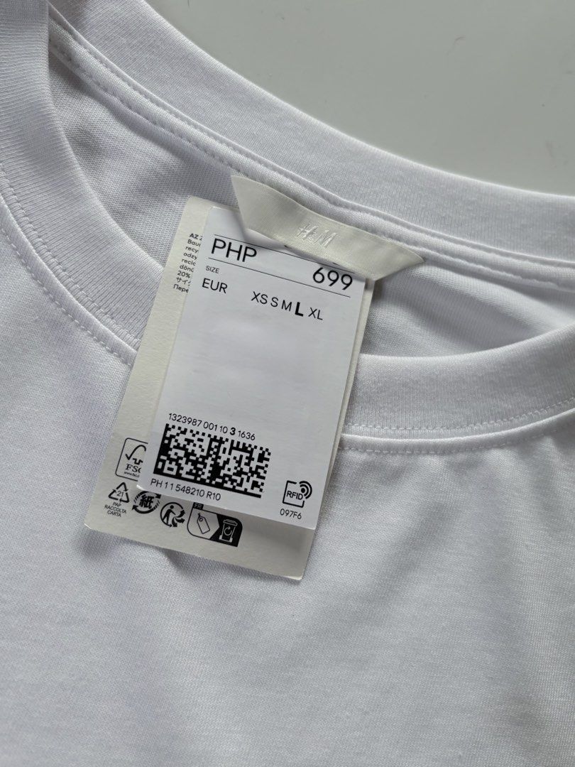 H&M White Long Sleeve "Les Nuits De Paris" (Category: Tshirts & Polo Shirts ) located in Manila. Submitted by izzmya (Listing ID 1456270279, Image 3). Description: - Brand: H&M - Color: White - Style: Long Sleeve - Graphic: "Les Nuits De Paris 1998" print on front - Neckline: Crew neck - Condition: Brand new with tags, but the tags are no longer attached - Material: Comfortable fabric It runs oversized Length: 28inch Width: 25inch.