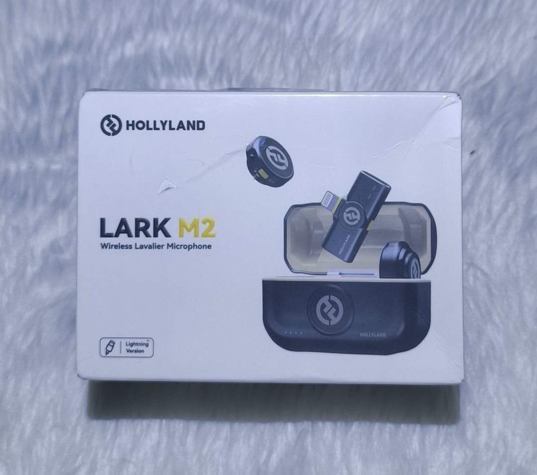 Hollyland LARK M2 Wireless Lavalier Microphone (Lightning Version) (Category: Microphones) located in Manila. Submitted by elladejesus.05 (Listing ID 1456376963, Image 1). Description: Hollyland LARK M2 Wireless Lavalier Microphone (Lightning Version) Brand New Sealed! - 100% Genuine Hollyland Product - Compact button size - 300m Stable Transmission Range - Studio-Grade 48kHz/24-bit Hi-Fi Sound Quality - Smart Environmental Noise Cancellation - K