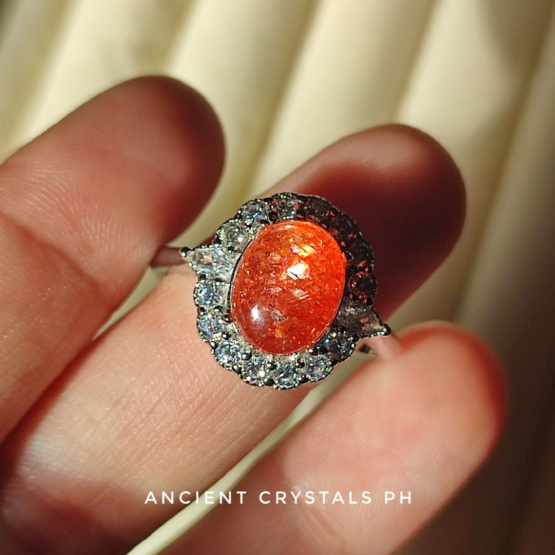 HQ Sunstone Ring ~ “Mia” ☀️ (Category: Rings) located in Makati City. Submitted by ancientph (Listing ID 1456409931, Image 3). Description: HQ Sunstone Ring ~ “Mia” ☀️ From the Golden Hours Collection Good for: -Instills vitality, warmth, and bright optimism -Boosts leadership, power, and personal strength -Attracts good fortune and unexpected luck -Clears stress and releases emotional dependencies °•°•°•°•°• Type: Adjustable ring from size 4-8 M