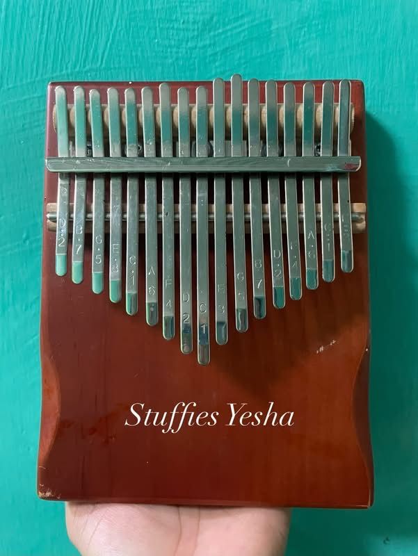 Kalimba Thumb Piano (Category: Musical Instruments) located in Manila. Submitted by stuffiesyesha (Listing ID 1456394590, Image 1). Description: Solid Wood .
