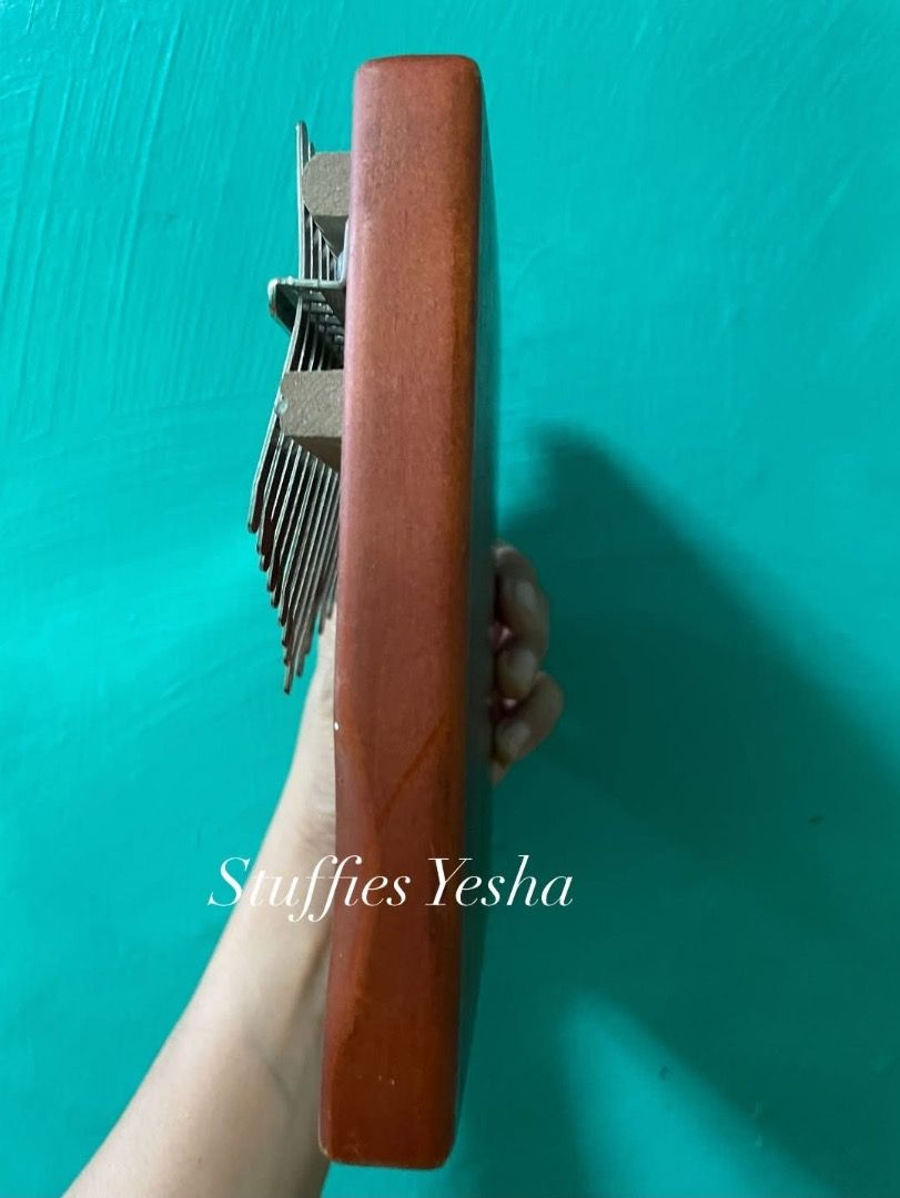 Kalimba Thumb Piano (Category: Musical Instruments) located in Manila. Submitted by stuffiesyesha (Listing ID 1456394590, Image 3). Description: Solid Wood .