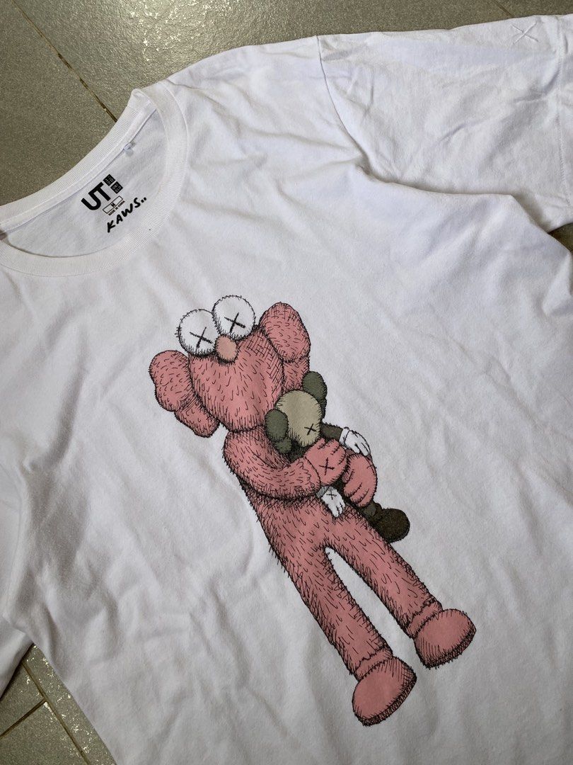 Kaws X Uniqlo Tshirt (Category: Tshirts & Polo Shirts ) located in Digos. Submitted by thriftflexph (Listing ID 1456348290, Image 3). Description: Size&Dimes:20/28 Color&Condi:9/10 issue:Last pic Pero sobrang puti pa. DM for more information 🫶 Items are all thrifted/Handpicked Can ship nationwide🇵🇭 Add Shipping Fee ✈️🎁.