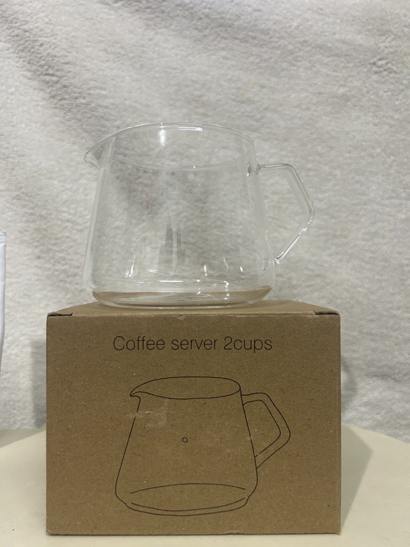 KINTO Slow Coffee Style Glass Coffee Server 2 Cups (Category: Coffee & Tea Tableware) located in Manila. Submitted by potchi.thrifts (Listing ID 1456396970, Image 1). Description: - KINTO Slow Coffee Style glass coffee server - Capacity: 2 cups - Material: Clear glass - Features: Handle and spout for easy pouring - Ideal for brewing your favorite coffee - Comes in original packaging.