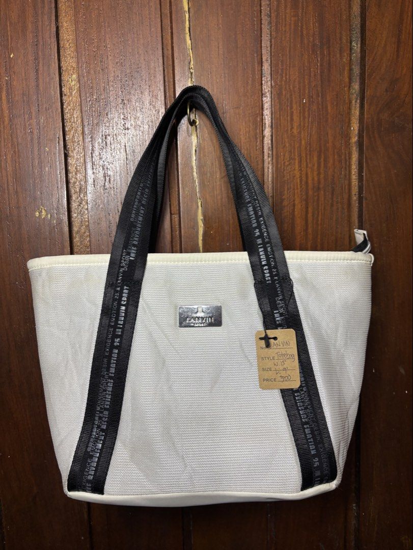 Lanvin Sport (Category: Luxury Bags & Wallets) located in Legazpi City. Submitted by thesource052 (Listing ID 1456407342, Image 1). Description: Lanvin Sport Vintage Authentic Needs wash only No major issues: Width:13” Length:9” Excellent condition.