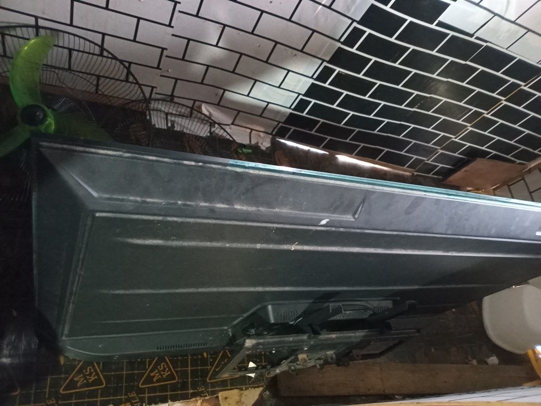 Large Flat Screen TV (Category: TV) located in Cavite. Submitted by jamstore89 (Listing ID 1456380187, Image 2). Description: Skyworth 55” No display P1800 Large flat screen television - Back of TV shows some dust and wear - Stand is attached - Power cord is included - Ideal for living rooms or entertainment areas.