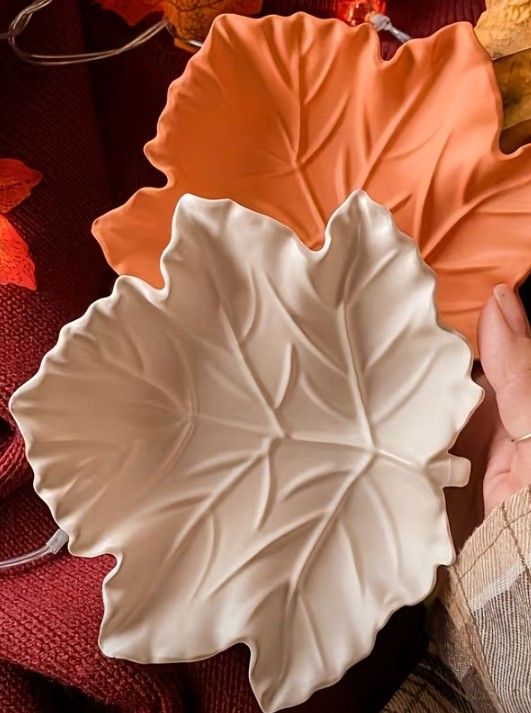 Leaf Shaped Ceramic Trinket Dish - White (Category: Other Kitchenware & Tableware) located in Las Pinas. Submitted by deehlilah (Listing ID 1456308547, Image 2). Description: - Cute Big Maple leaf-shaped trinket dish - Perfect for holding rings or small jewelry - Made of durable ceramic - Comes in a clean white color - Also available in orange or beige color - Ideal for bedside tables or dressers.