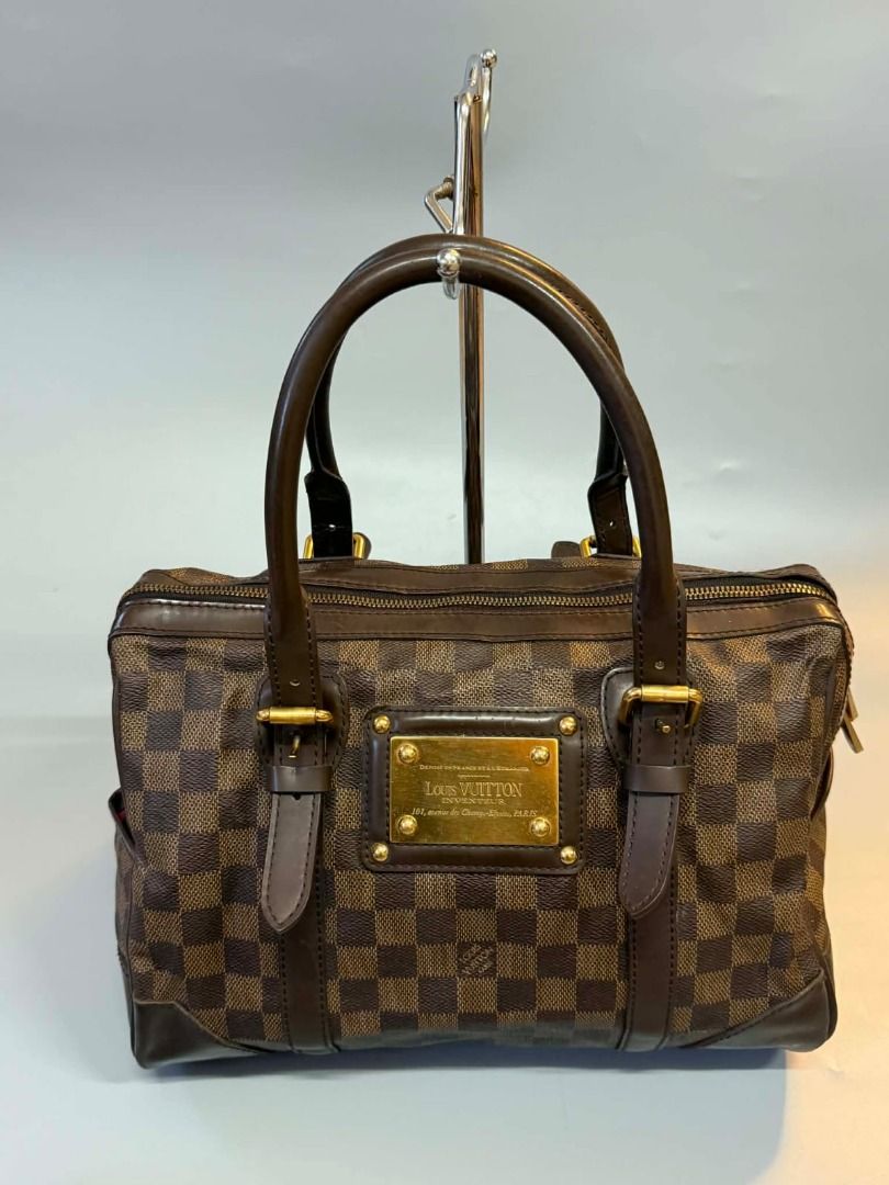 Louis Vuitton Damier Canvas (Category: Luxury Bags & Wallets) located in Caloocan City. Submitted by refreshmycloset444 (Listing ID 1456302852, Image 1). Description: - Authentic Louis Vuitton - Damier Ebene Canvas with classic checkered pattern - Brown leather trim and handles - Gold-tone hardware - Red interior lining with pockets - Secure zipper closure - A timeless and iconic LV handbag.