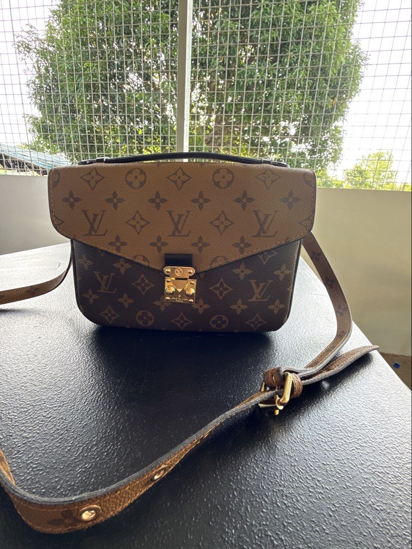 Louis Vuitton LV Pochette Metis Reverse Monogram (Category: Shoulder Bags) located in Panglao. Submitted by whatsdbuzz (Listing ID 1456301742, Image 1). Description: Louis Vuitton Pochette Metis Reverse Monogram - Classic and versatile design -preloved in good condition - ukay-sourced from Korea.