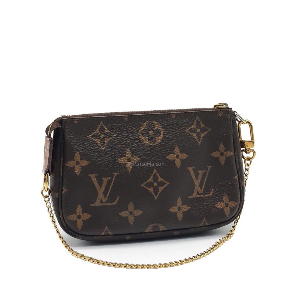 Louis Vuitton Mini Pochette Accessories in Monogram Canvas (Datecode: SF4290) (Category: Luxury Bags & Wallets) located in Taguig. Submitted by pursemaison (Listing ID 1456318605, Image 2). Description: Louis Vuitton Mini Pochette Accessories in Monogram Canvas (Datecode: SF4290) Price: Php 21,000.00 Condition: Fair (7.5/10) Exterior: Moderate creasing on canvas, rubs and stains on leather trim, minor marks on some part of the canvas Interior: Ob