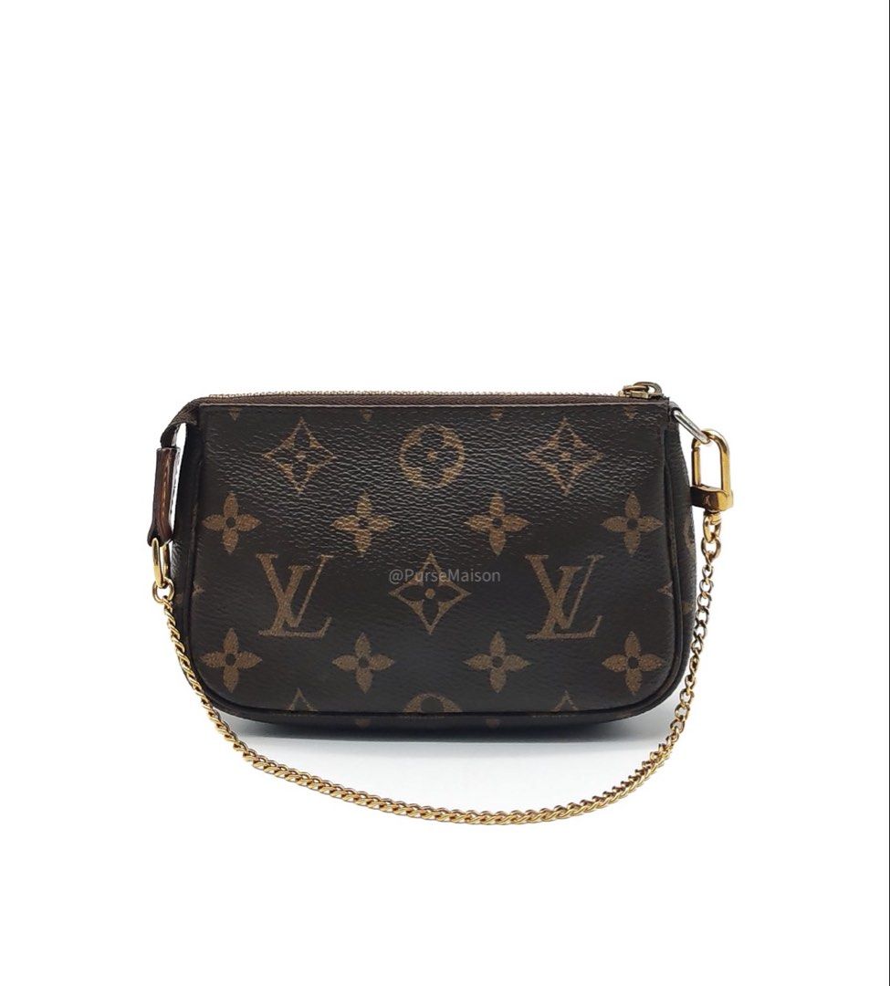 Louis Vuitton Mini Pochette Accessories in Monogram Canvas (Datecode: SF4290) (Category: Luxury Bags & Wallets) located in Taguig. Submitted by pursemaison (Listing ID 1456318605, Image 1). Description: Louis Vuitton Mini Pochette Accessories in Monogram Canvas (Datecode: SF4290) Price: Php 21,000.00 Condition: Fair (7.5/10) Exterior: Moderate creasing on canvas, rubs and stains on leather trim, minor marks on some part of the canvas Interior: Ob
