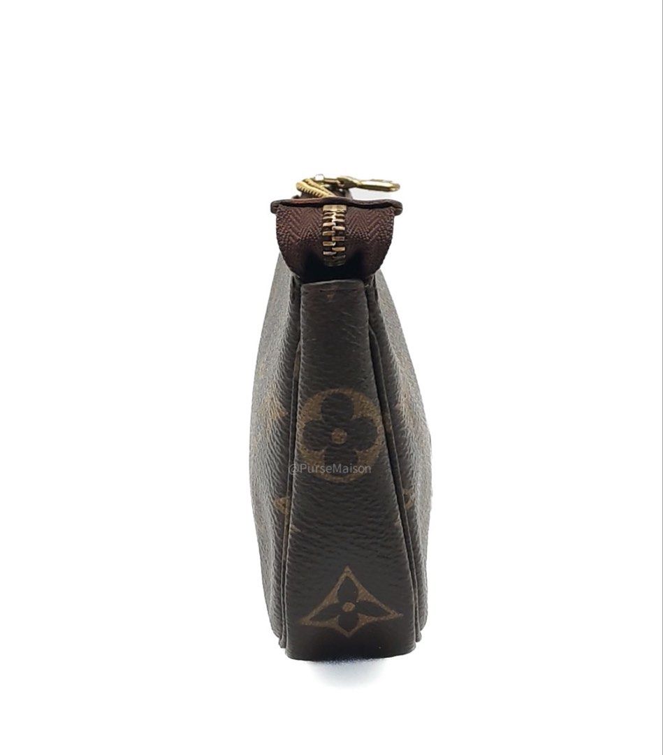 Louis Vuitton Mini Pochette Accessories in Monogram Canvas (Datecode: SF4290) (Category: Luxury Bags & Wallets) located in Taguig. Submitted by pursemaison (Listing ID 1456318605, Image 3). Description: Louis Vuitton Mini Pochette Accessories in Monogram Canvas (Datecode: SF4290) Price: Php 21,000.00 Condition: Fair (7.5/10) Exterior: Moderate creasing on canvas, rubs and stains on leather trim, minor marks on some part of the canvas Interior: Ob