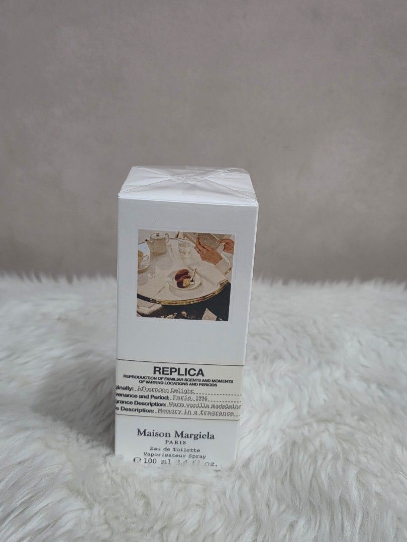 Maison Margiela Replica Eau de Toilette 100ml (Category: Fragrance & Deodorants) located in Valenzuela. Submitted by cbianx (Listing ID 1456382524, Image 1). Description: - Maison Margiela Replica Eau de Toilette - Scent: Afternoon Delight - Size: 100ml - Fragrance Profile: Sweet - Condition: Brand new, sealed in original packaging - Ideal for: Gifting or personal collection.