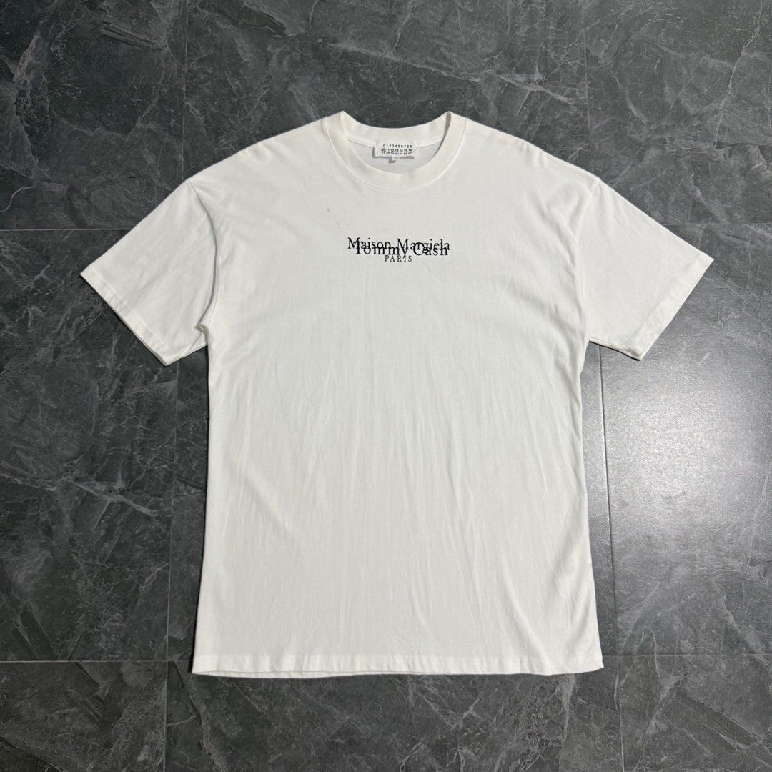 Maison Margiela X Tommy Cash (Category: Tshirts & Polo Shirts ) located in Paniqui. Submitted by justyntrouves (Listing ID 1456345105, Image 2). Description: Best Size: XL (Dimensions in inches) Width: 22.5 Length: 31 Pen stain on upper chest Buyer will shoulder the shipping fee. Don’t expect too much, thrifted items. Read the description and check all photos before purchasing. For any questions, feel free to ask..