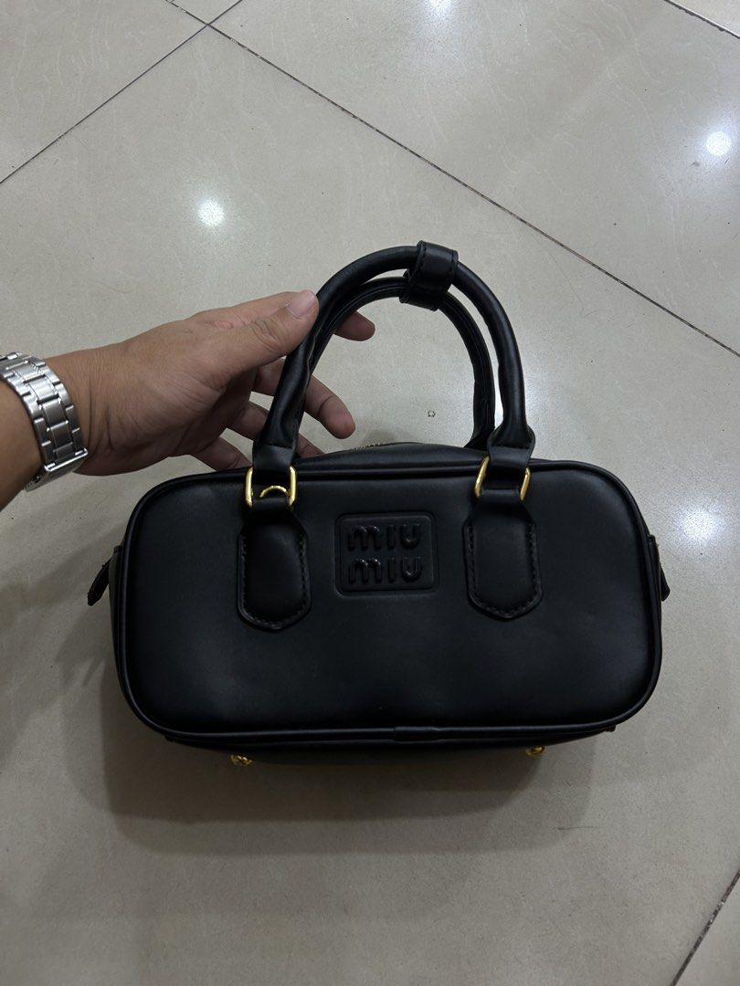 Miu Miu Arcadie leather mini-bag (Category: Luxury Bags & Wallets) located in Bacolod City. Submitted by fyceee (Listing ID 1456348527, Image 1). Description: Miu Miu Arcadie leather mini-bag - Good Condition - No Flaws - Price 📩📩📩 𝟭𝘀𝘁 𝘁𝗼 𝗽𝗮𝘆 𝗴𝗲𝘁𝘀 𝘁𝗵𝗲 𝗶𝘁𝗲𝗺 𝗣𝗮𝘆𝗺𝗲𝗻𝘁 Method: Gcash/Go Tyme Bank/BPI🧾 𝗦𝗵𝗶𝗽𝗽𝗶𝗻𝗴: J&T Express | Maxim 𝗟𝗼𝗰𝗮𝘁𝗶𝗼𝗻: Negros Occidental, 6100 📍.