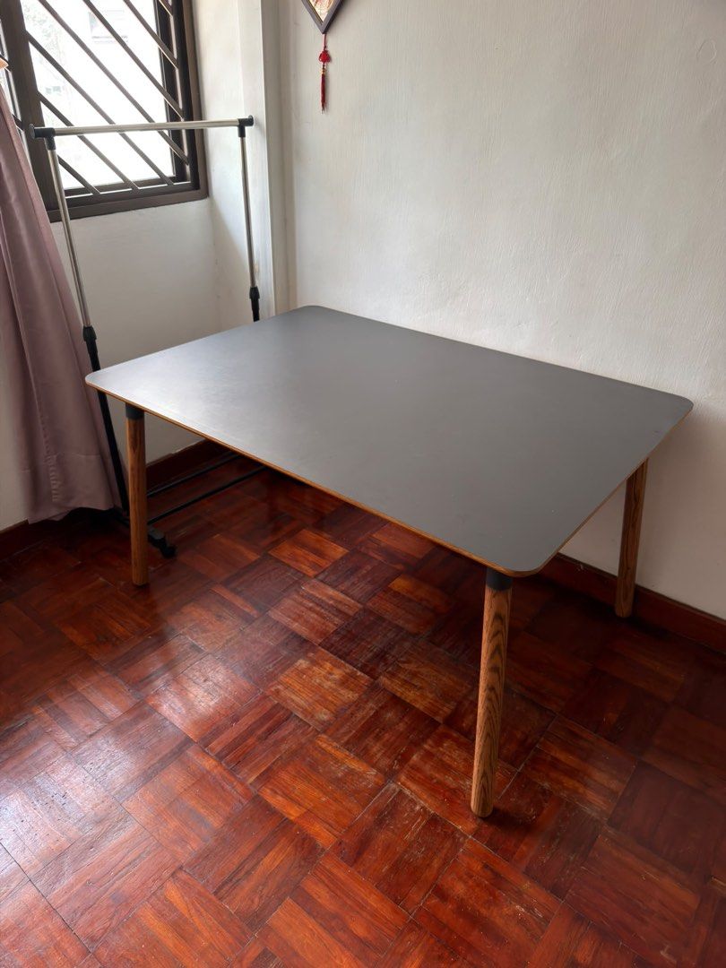 Table (Category: Tables & Sets) located in Singapore. Submitted by yukispot (Listing ID 1456362322, Image 2). Description: - Grey tabletop with rounded corners - Sturdy wooden legs - Ideal for study desk or small dining area - 1m X 1.5m.