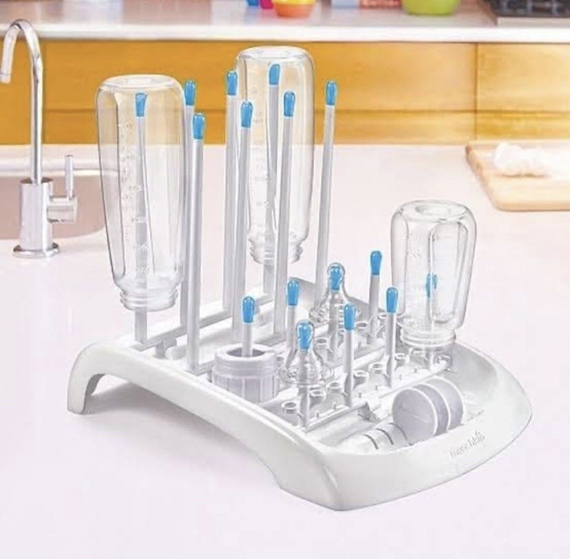 Munchkin Fold Bottle Drying Rack (Category: Breastfeeding & Bottle Feeding) located in Balanga. Submitted by littleyana.ph (Listing ID 1456321222, Image 3). Description: - Munchkin Fold bottle drying rack - Perfect for drying baby bottles, nipples, and accessories - Compact and foldable design for easy storage - Features blue tips on drying pegs - White base with a convenient drip tray -Bought in London, UK 🇬🇧.