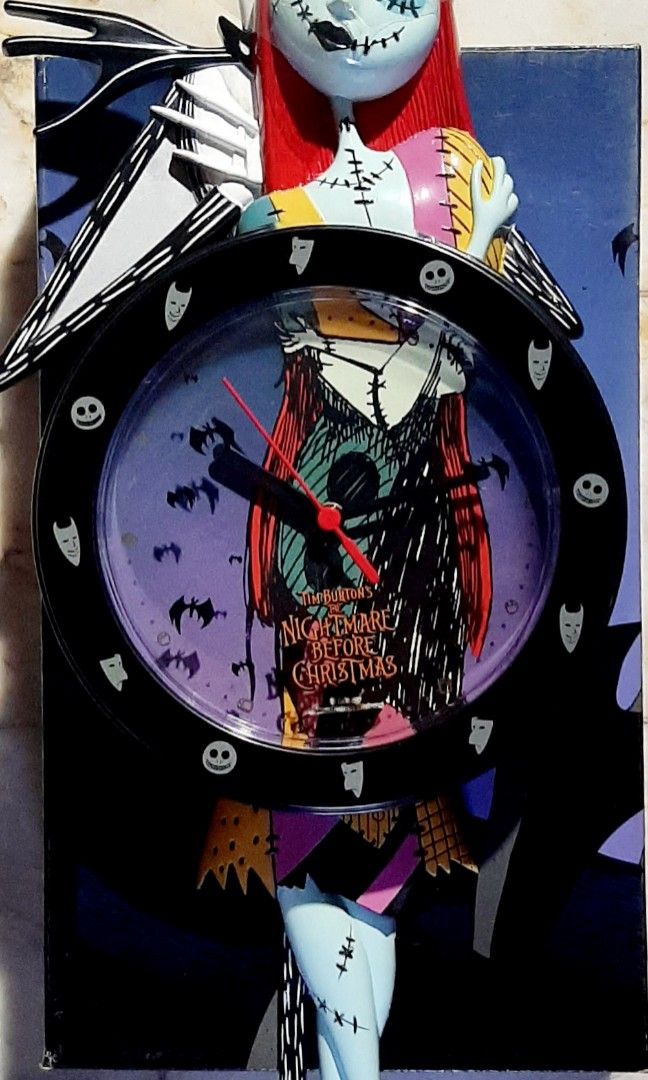 MZ Berger/NECA The Nightmare Before Christmas Pendulum Wall Clock (Category: Clocks) located in Liloan. Submitted by angelyneroberts_171329 (Listing ID 1456312078, Image 2). Description: FOR SALE MZ Berger/NECA The Nightmare Before Christmas Pendulum Wall Clock DESCRIPTION : - It was originally released around 2000–2003. - This is a Disney Tim Burton's The Nightmare Before Christmas Jack Skellington and Sally molded plastic pendulum wall clock wh