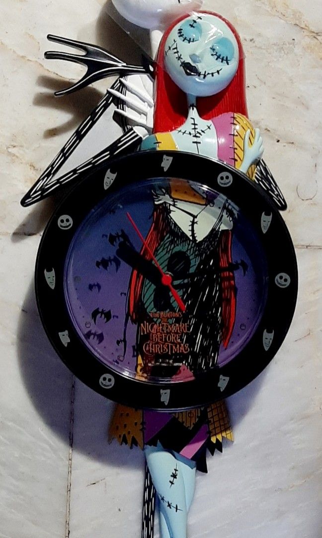 MZ Berger/NECA The Nightmare Before Christmas Pendulum Wall Clock (Category: Clocks) located in Liloan. Submitted by angelyneroberts_171329 (Listing ID 1456312078, Image 3). Description: FOR SALE MZ Berger/NECA The Nightmare Before Christmas Pendulum Wall Clock DESCRIPTION : - It was originally released around 2000–2003. - This is a Disney Tim Burton's The Nightmare Before Christmas Jack Skellington and Sally molded plastic pendulum wall clock wh