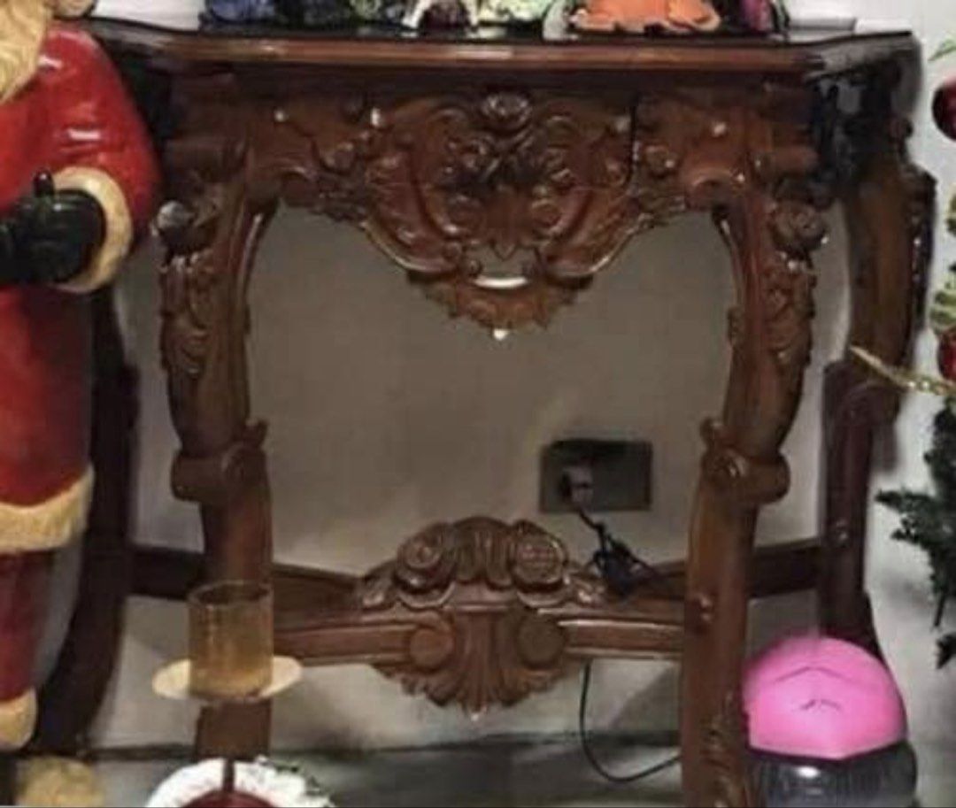 Narra Console Table & Mirror Set (Category: Other Home Furniture) located in Manila. Submitted by alldayshoppinggirl (Listing ID 1456416271, Image 2). Description: This piece is an ornate, hand-carved solid wood console table featuring elaborate baroque scrollwork and a decorative lower shelf & a vintage and antique ornate carved wooden wall mirror featuring classic Rococo and Victorian-inspired scrollwork. Design: Crafted with an intricately car