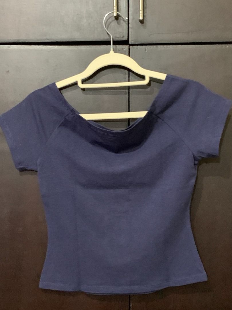 Navy Blue Off-Shoulder Short Sleeve Top (Category: Blouses) located in Binan City. Submitted by lviray (Listing ID 1456260864, Image 2). Description: - Navy blue top - Wide neckline - Short sleeves - Fitted waist - Comfortable fabric - Versatile: great for casual wear or dressing up.