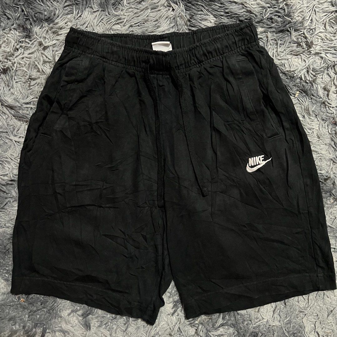 Nike Black sweat Shorts Men's (Category: Shorts) located in Santo Tomas. Submitted by miggy.thrift (Listing ID 1456262499, Image 3). Description: Size 30-31 Length 18.5 Excellent - Classic black Nike shorts - Comfortable elastic waistband with drawstring - Versatile: Great for workouts or casual wear - Easy to wear, comfortable fit - Please check photos for detailed measurements.