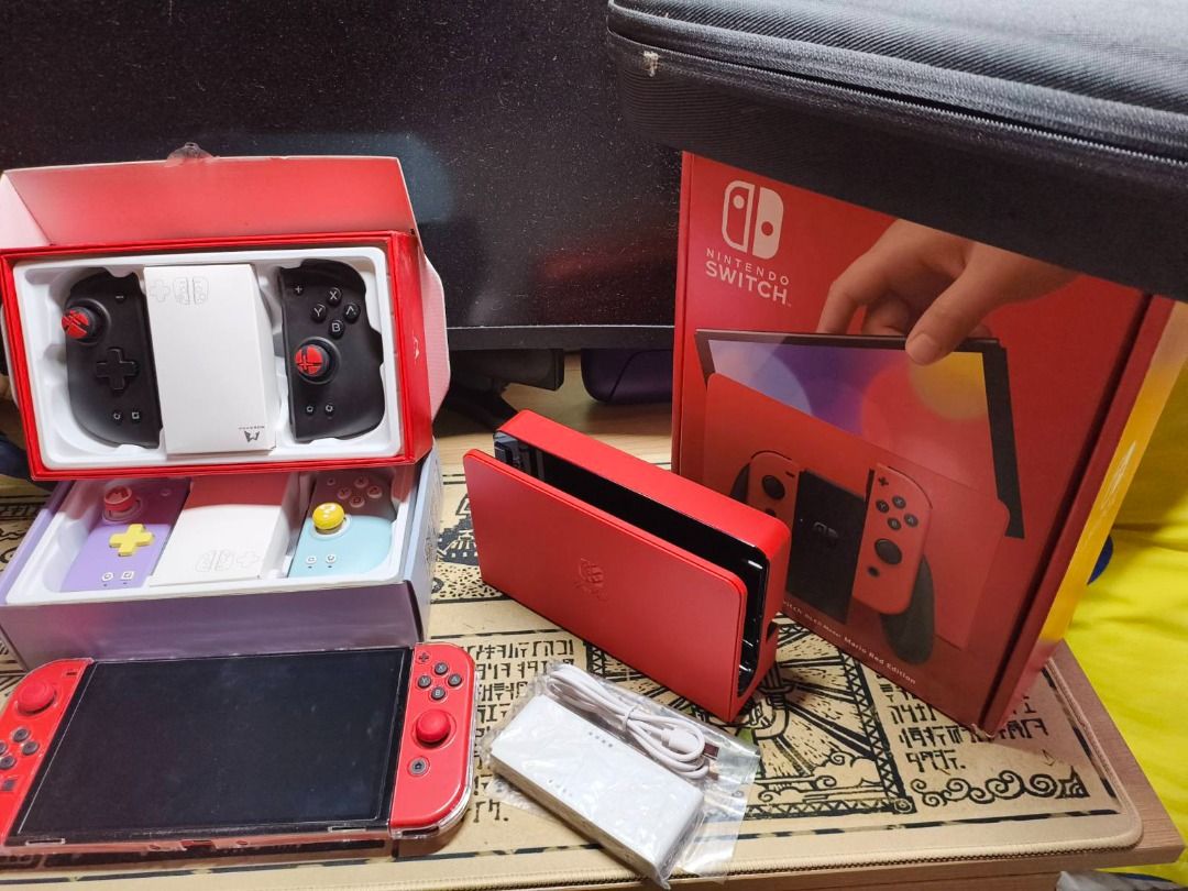 Nintendo Switch OLED Mario Red Edition (Complete Set + Accessories w/ Digital Games) (Category: Nintendo) located in Caloocan City. Submitted by livebear_290ace (Listing ID 1456327254, Image 3). Description: Nintendo Switch OLED - Mario Red Edition (Slightly Used / Like New) Selling my pre-loved Nintendo Switch OLED Mario Red Edition. Very fresh condition, crisp screen, protected since day one. Complete with original box, all stock accessories, p
