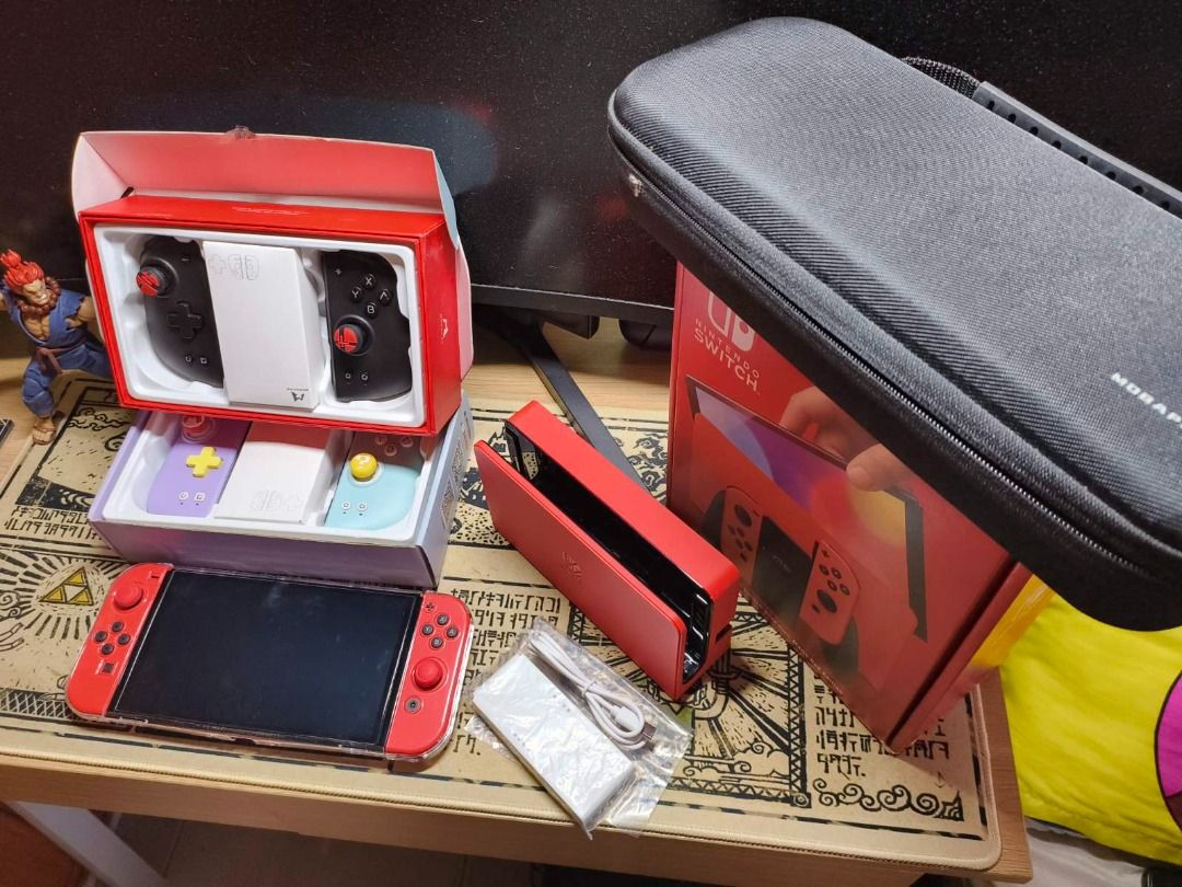 Nintendo Switch OLED Mario Red Edition (Complete Set + Accessories w/ Digital Games) (Category: Nintendo) located in Caloocan City. Submitted by livebear_290ace (Listing ID 1456327254, Image 2). Description: Nintendo Switch OLED - Mario Red Edition (Slightly Used / Like New) Selling my pre-loved Nintendo Switch OLED Mario Red Edition. Very fresh condition, crisp screen, protected since day one. Complete with original box, all stock accessories, p