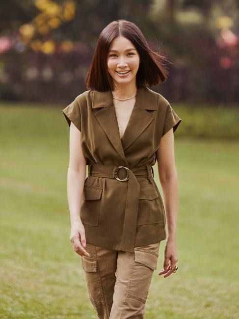 Olive Green Vest Jacket with Belt (Category: Coats, Jackets and Outerwear) located in Muntinlupa City. Submitted by shmeesh (Listing ID 1456233990, Image 2). Description: - Loft sleeveless vest jacket - Chic olive green color - Includes matching belt with gold ring detail - Features two functional front pockets - Perfect for layering to add polish and structure.