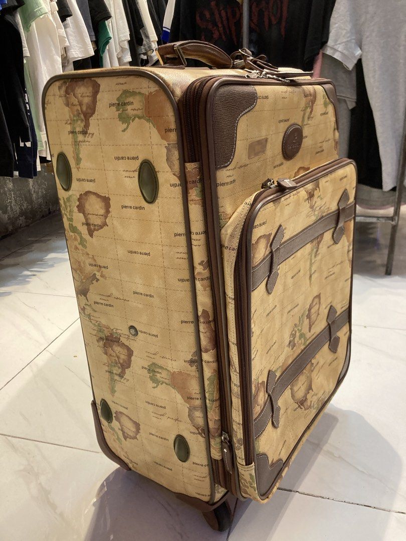 Pierre Cardin World Map Luggage Set (Category: Luxury Bags & Wallets) located in Quezon City. Submitted by janisu0303 (Listing ID 1456408582, Image 2). Description: - Vintage Pierre Cardin Map luggage set - Features a cool all-over world map print -10,000 php - Includes one large suitcase and one smaller carry-on bag - bags have wheels and handles for easy transport - Large suitcase has a combination lock - Ideal for travel enthusiasts Fairview a