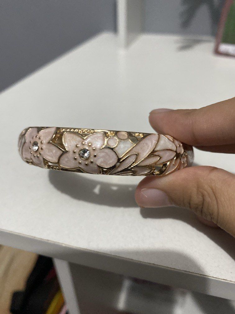 pink and white bangle (Category: Body Jewelry) located in Dasmarinas. Submitted by tokikiki (Listing ID 1456341388, Image 2). Description: rfs: not my style .