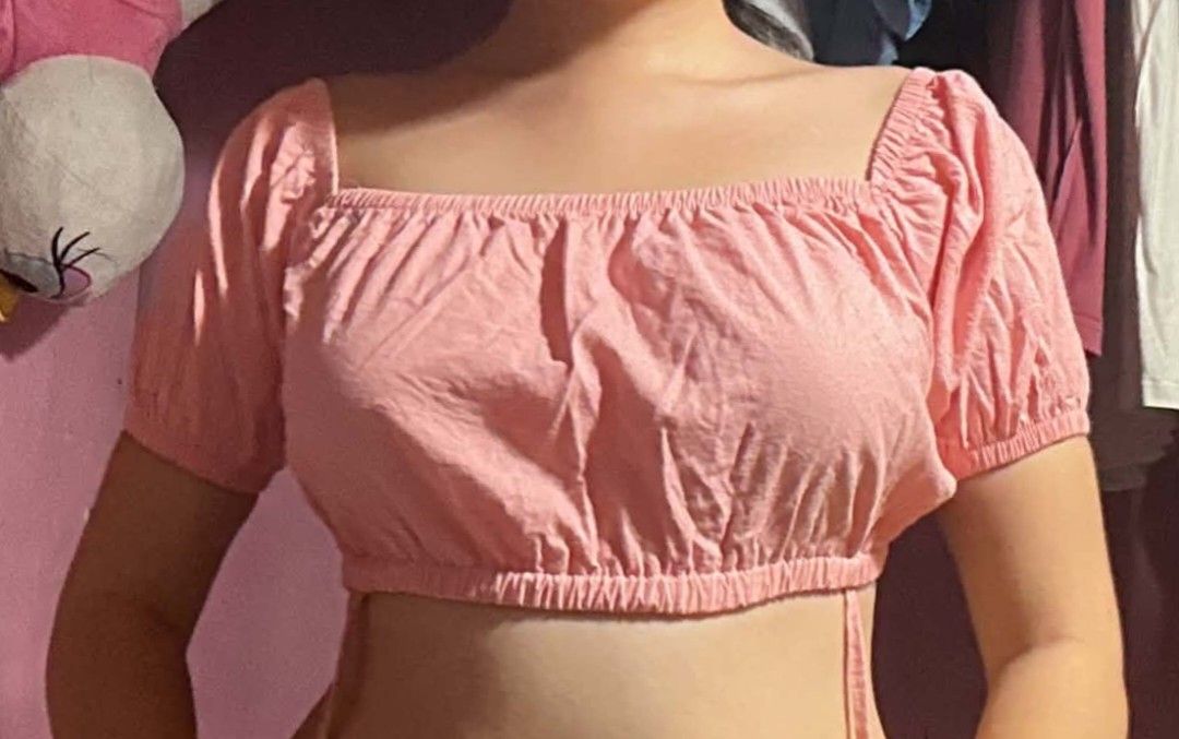 Pink Square Neck Puff Sleeve Crop Top with Tie Back (Category: Blouses) located in Manila. Submitted by daisyparl (Listing ID 1456318944, Image 1). Description: - Adorable pink crop top - Chic square neckline - Trendy puff sleeves - Adjustable tie-back for a custom fit - Lightweight and textured fabric - Perfect for casual outings or dressing up - Pairs well with shorts or skirts.