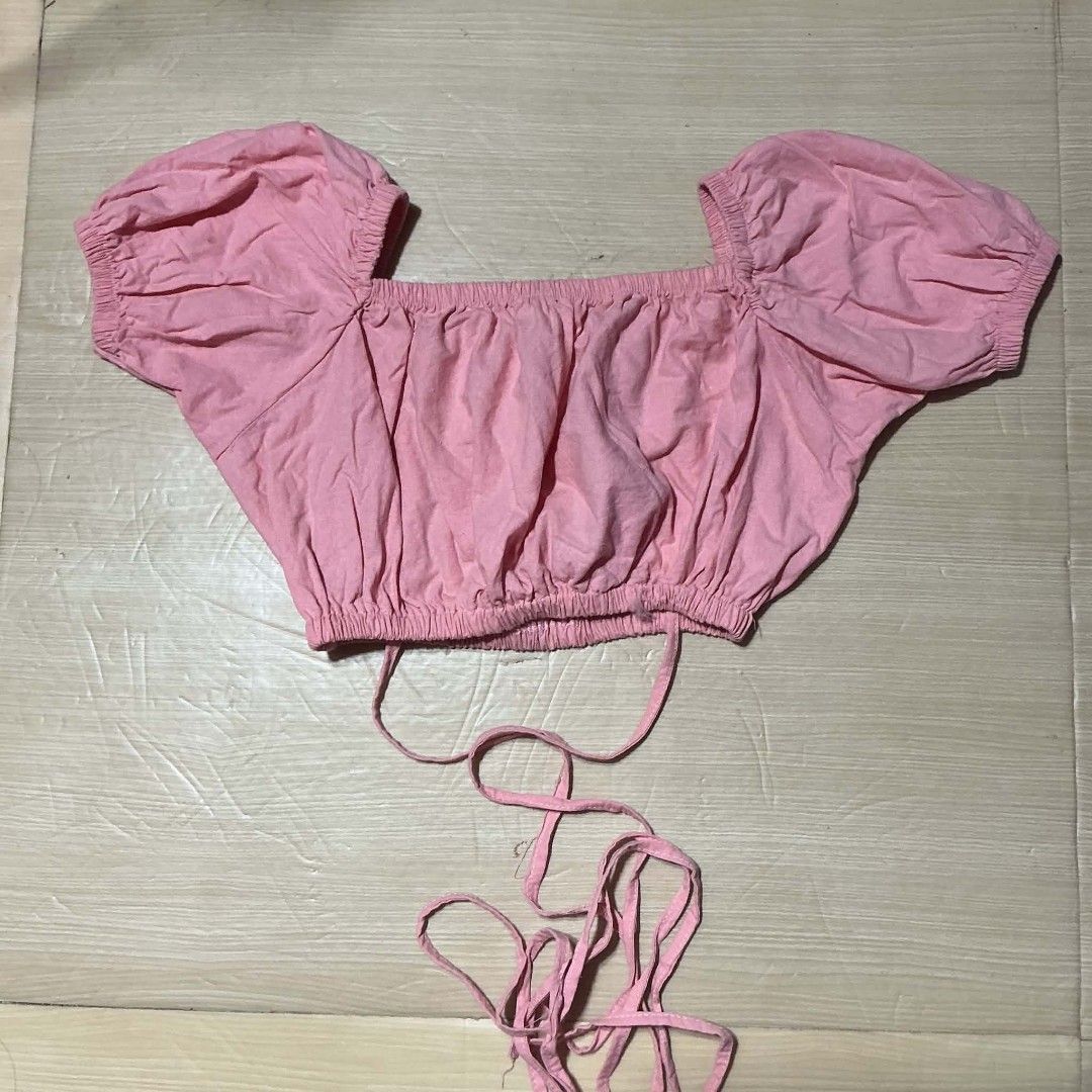 Pink Square Neck Puff Sleeve Crop Top with Tie Back (Category: Blouses) located in Manila. Submitted by daisyparl (Listing ID 1456318944, Image 2). Description: - Adorable pink crop top - Chic square neckline - Trendy puff sleeves - Adjustable tie-back for a custom fit - Lightweight and textured fabric - Perfect for casual outings or dressing up - Pairs well with shorts or skirts.