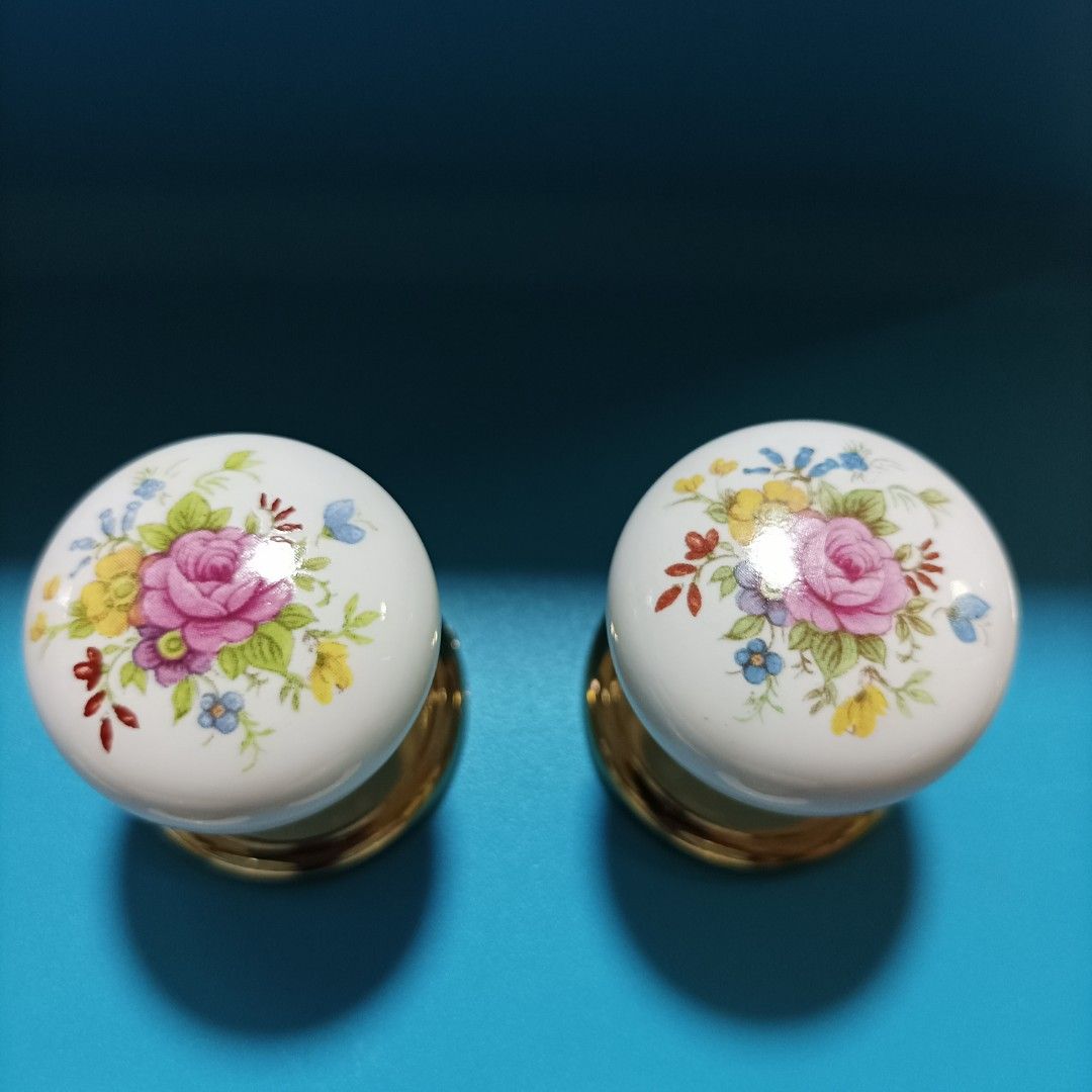 Porcelain knobs (Category: Other Home Decor) located in Singapore. Submitted by chk8888 (Listing ID 1456306328, Image 3). Description: - Set of charming porcelain knobs - Features delicate floral patterns and romantic pastoral scenes - Elegant gold-toned bases - Ideal for cabinets, drawers, and furniture restoration - Adds a vintage and classic aesthetic - Available for meetups at Hillion Mall MRT Plaza (Outside Bukit Panjang MRT).