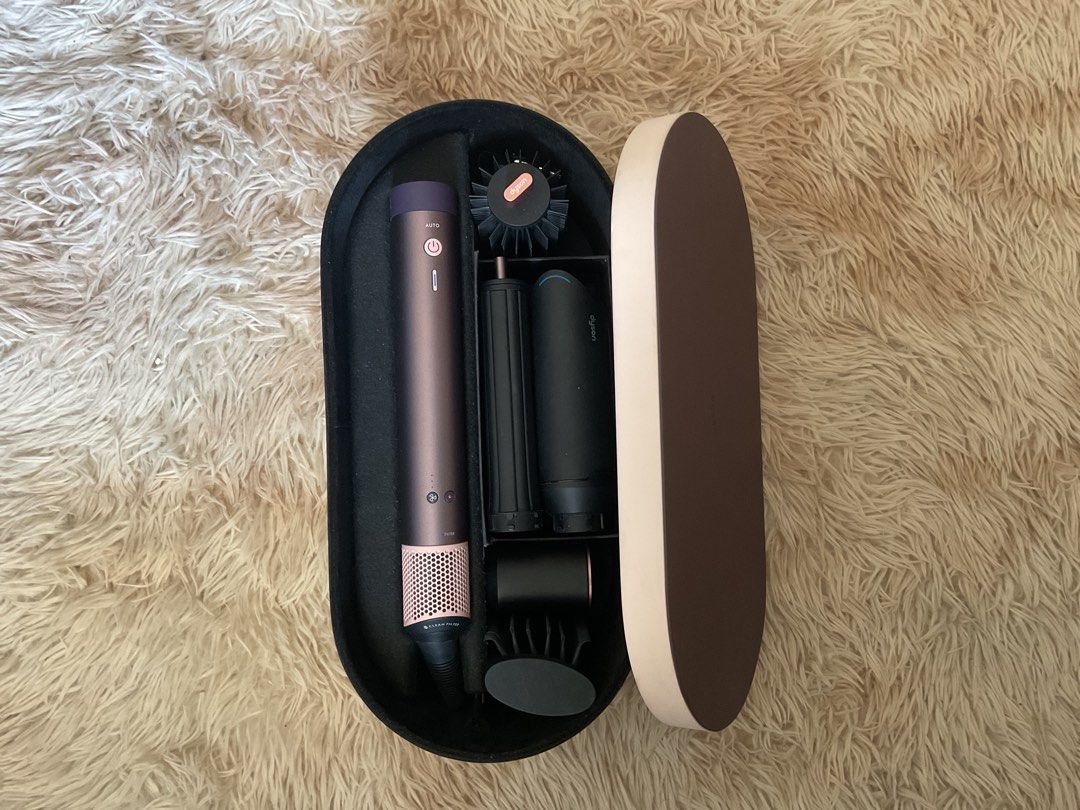 Dyson Airwrap Coanda 2x Jasper Plum (Category: Hair) located in Lapu Lapu. Submitted by denverjames (Listing ID 1456271461, Image 2). Description: Complete attachments sets.
