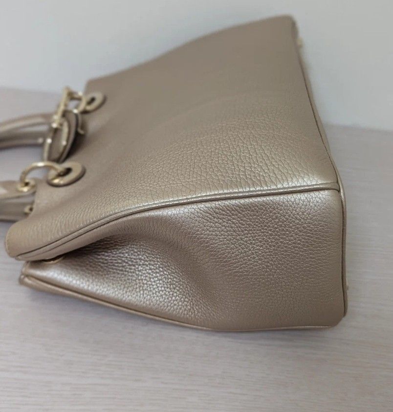 Preloved Authentic Diorissimo VIP Champagne Gold (Category: Luxury Bags & Wallets) located in Quezon City. Submitted by kairobkoy (Listing ID 1456348633, Image 3). Description: Preloved Authentic Diorissimo VIP Champagne Gold Grained calfskin leather.