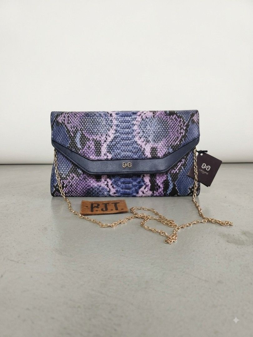 Purple and Blue Snakeskin pattern Clutch Bag (Category: Luxury Bags & Wallets) located in Baguio. Submitted by rjtbootshop2600 (Listing ID 1456391200, Image 1). Description: .