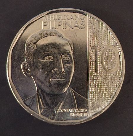 QR Code Philippine 10 Piso Coin - Apolinario Mabini (Category: Currency) located in Tagaytay City. Submitted by maestraklarissa (Listing ID 1456289390, Image 2). Description: - Authentic Philippine 10 Piso coin - Features Apolinario Mabini's portrait - Inscribed with 'Republic of the Philippines' - With QR Code - Ideal for coin collectors - Makes a great souvenir or gift.